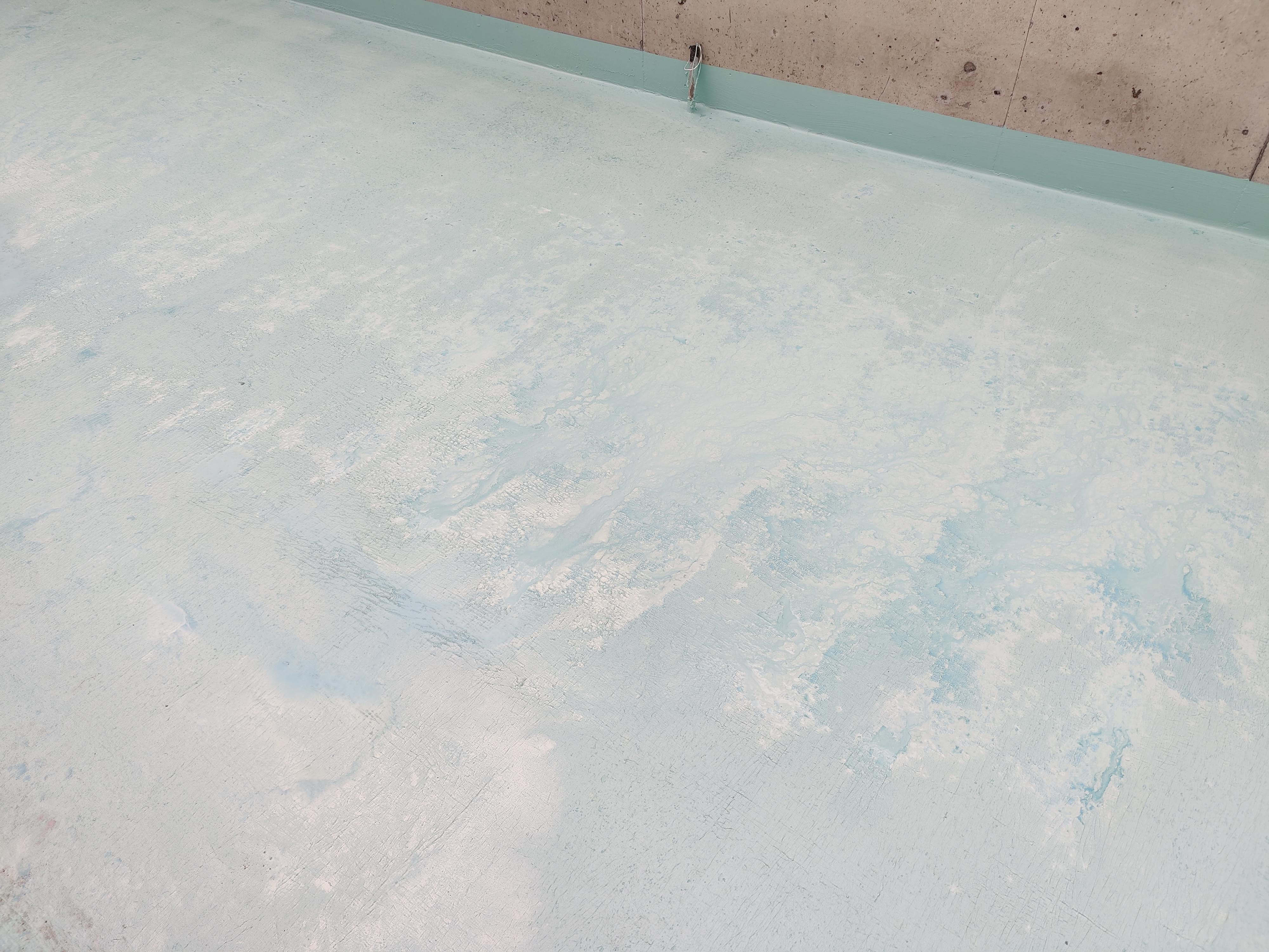 This is what Nitoproof 810 looks like when it rains before the product is fully cured.